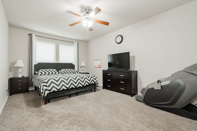 bedroom featuring ceiling fan and light colored carpet