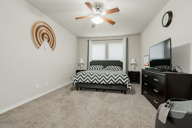 bedroom with ceiling fan and carpet floors