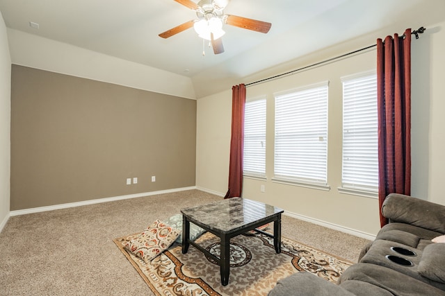 living room with light carpet and ceiling fan