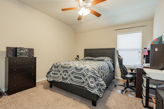 bedroom featuring ceiling fan, light colored carpet, and lofted ceiling