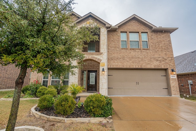 3204 Sunny Hill Way, Royse City, TX 75189 - view of front of property with brick siding, a garage, concrete driveway, and stone siding