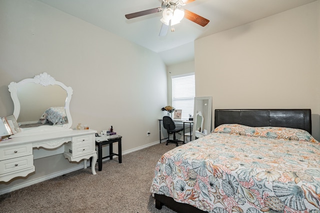 carpeted bedroom featuring ceiling fan and vaulted ceiling