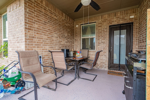 view of patio / terrace featuring ceiling fan