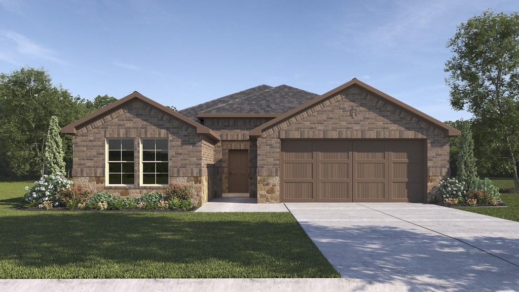 view of front facade with a garage and a front yard