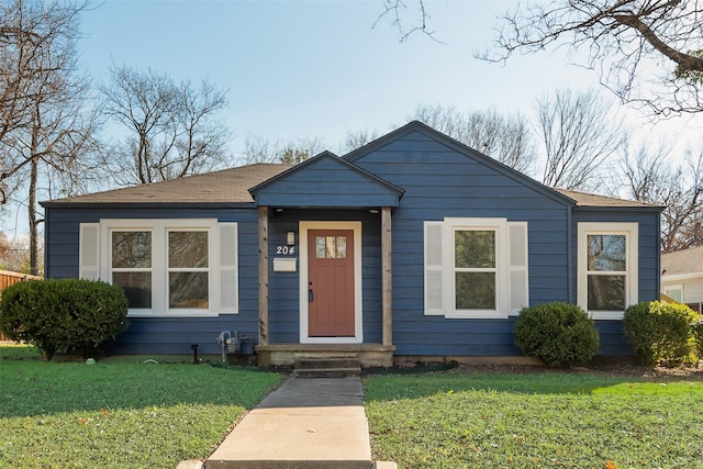 bungalow with a front yard