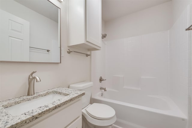 full bathroom featuring vanity, toilet, and  shower combination