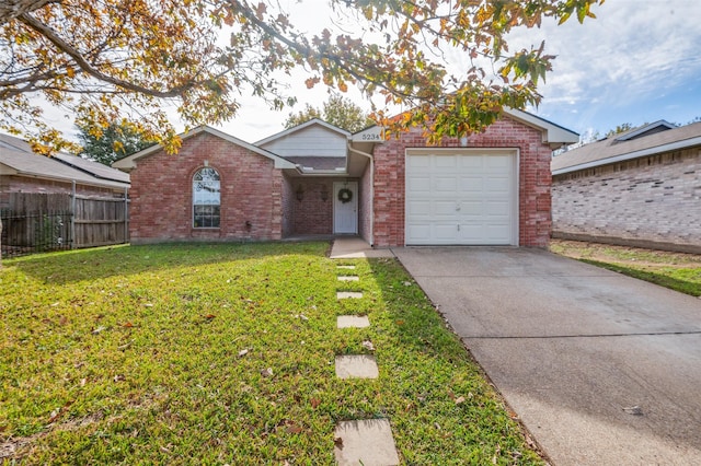 single story home featuring a garage and a front lawn