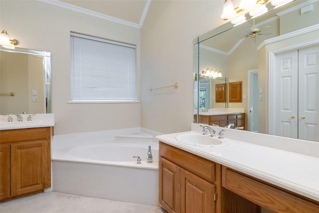 bathroom with ceiling fan, a washtub, crown molding, lofted ceiling, and vanity