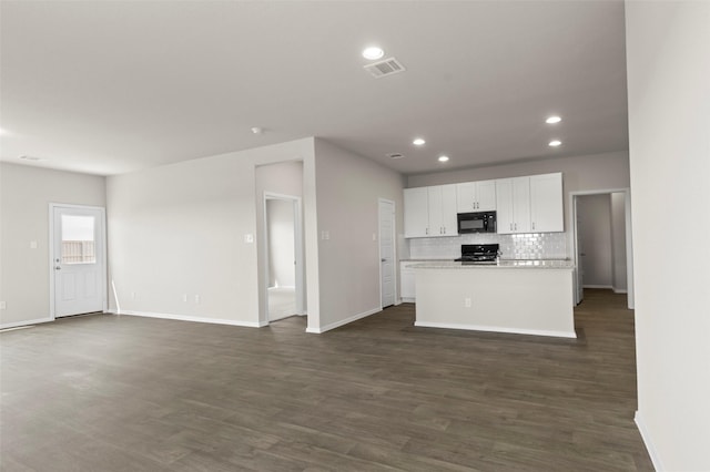1906 Sweetwater Dr, Forney, TX 75126 - kitchen featuring visible vents, black appliances, tasteful backsplash, white cabinetry, and light countertops