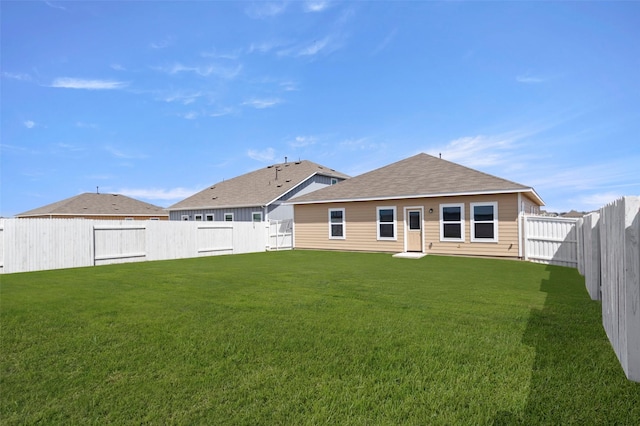 1906 Sweetwater Dr, Forney, TX 75126 - back of property with a fenced backyard, a shingled roof, and a yard