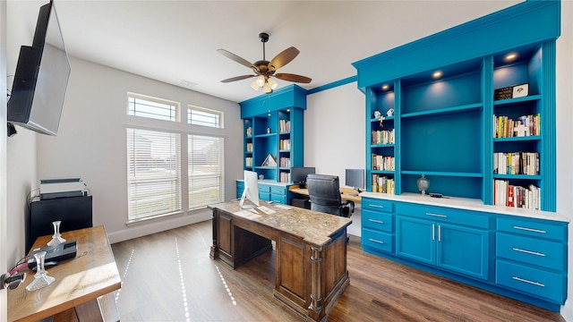 office area featuring ceiling fan, crown molding, and dark hardwood / wood-style floors