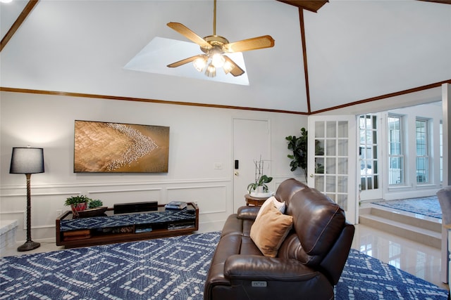 living room with vaulted ceiling and ceiling fan