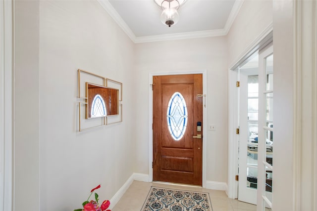 entrance foyer featuring plenty of natural light, light tile patterned flooring, and ornamental molding