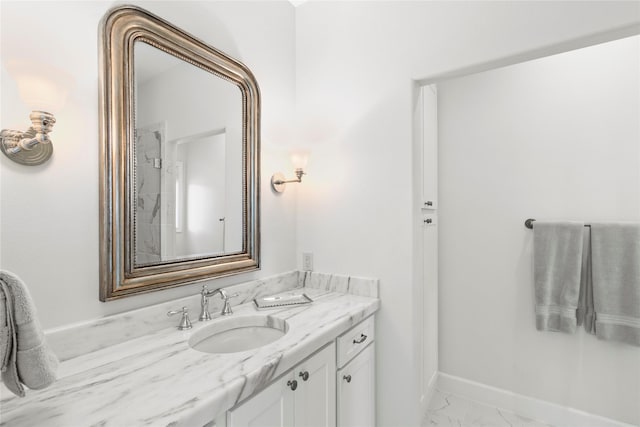 bathroom with vanity and walk in shower