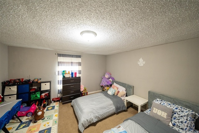 carpeted bedroom with a textured ceiling