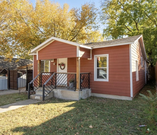 view of front of home with a front yard