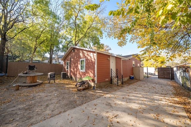 exterior space featuring central AC unit