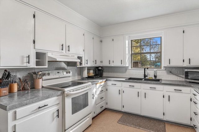 kitchen with white cabinets, electric stove, and sink