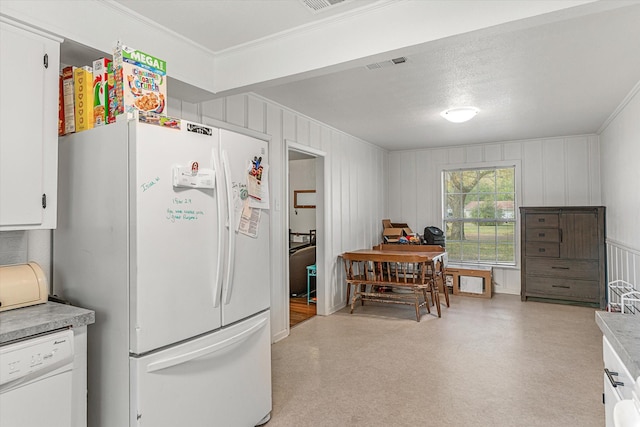 kitchen featuring white cabinetry, white appliances, and ornamental molding