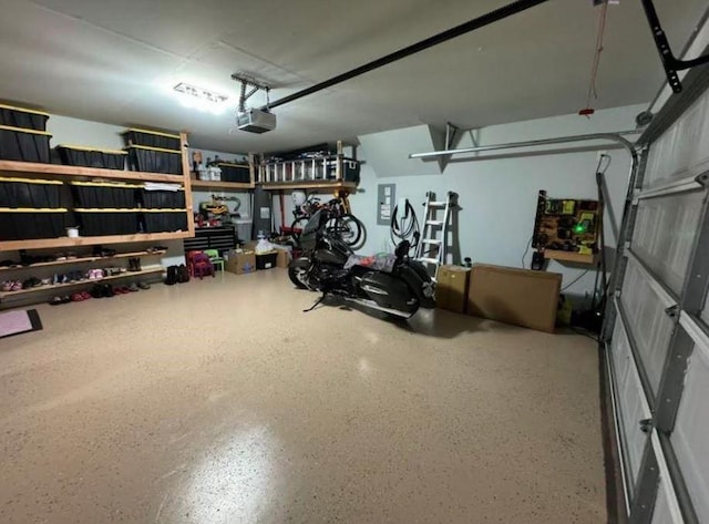 garage featuring a garage door opener