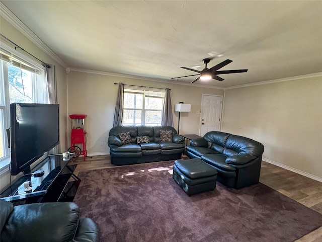 living room featuring hardwood / wood-style flooring, ceiling fan, and crown molding