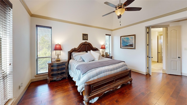 bedroom with ornamental molding, vaulted ceiling, and dark hardwood / wood-style floors