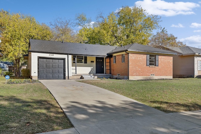 ranch-style home featuring a front yard and a garage