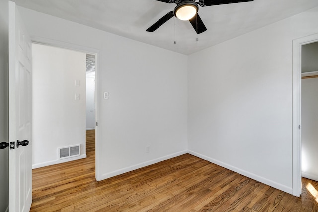 unfurnished bedroom featuring ceiling fan and light wood-type flooring