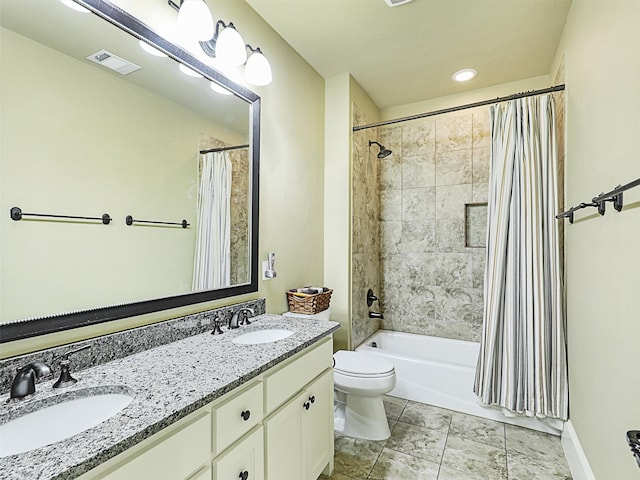 full bathroom featuring shower / bath combination with curtain, toilet, and vanity