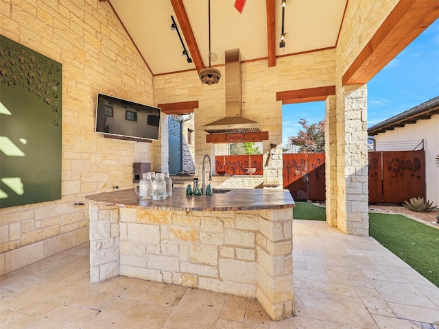 view of patio / terrace with an outdoor wet bar