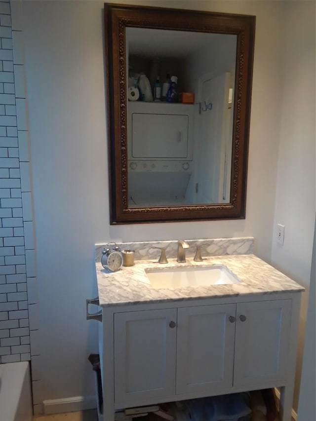 bathroom featuring vanity and independent shower and bath