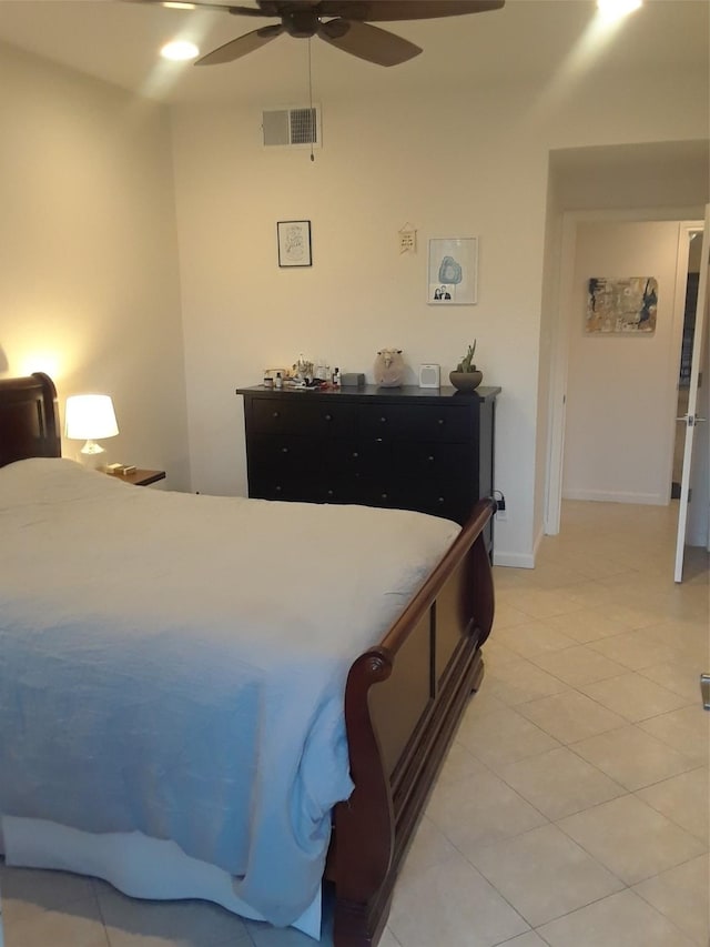 bedroom featuring ceiling fan and light tile patterned floors