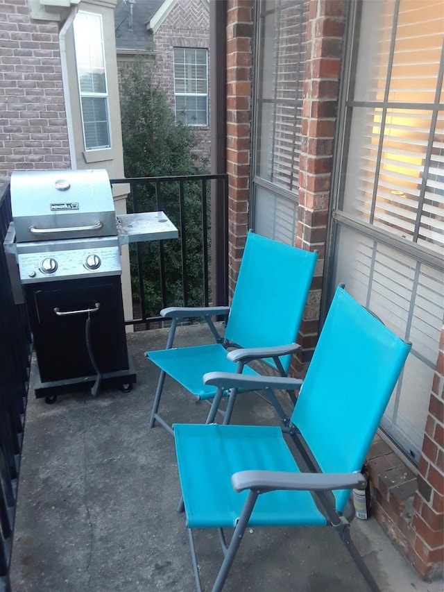 view of patio featuring a grill