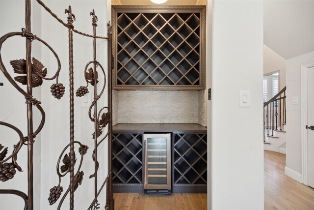 bathroom featuring vanity, plus walk in shower, and ornamental molding