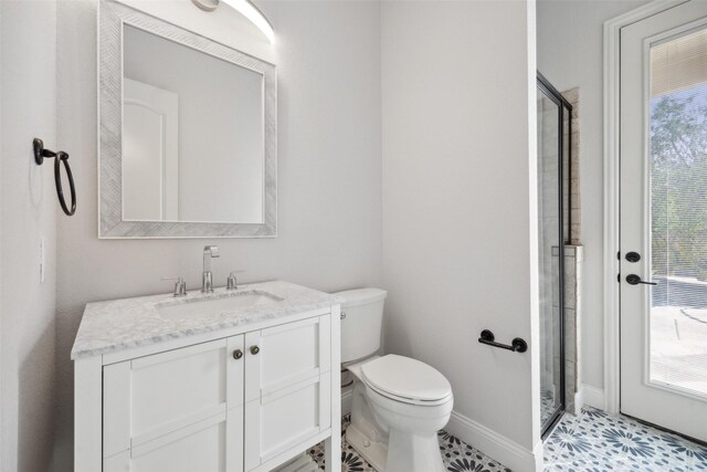 bathroom with vanity, tiled bath, and ornamental molding