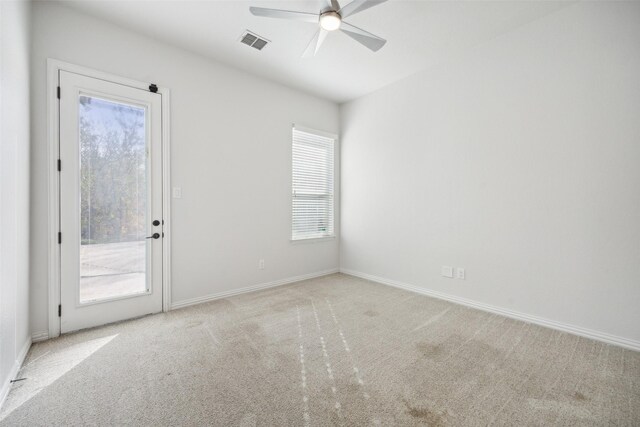 full bathroom featuring tile patterned flooring, vanity, tiled shower / bath combo, and toilet