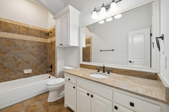 bathroom with toilet,  shower combination, and vanity