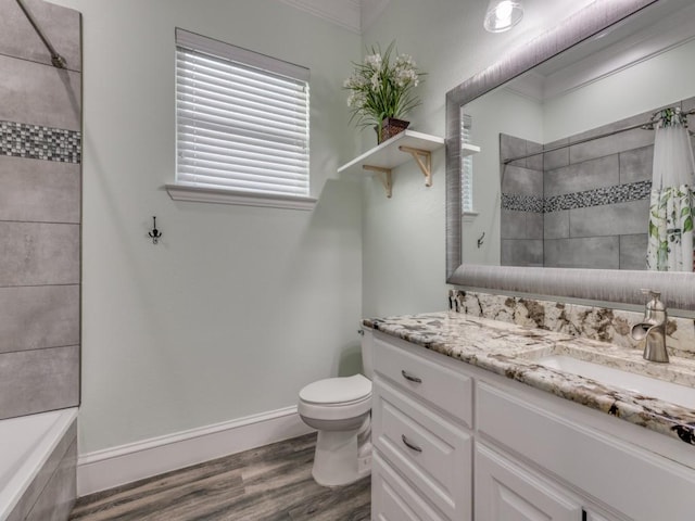 full bathroom featuring shower / bathtub combination with curtain, toilet, vanity, and hardwood / wood-style flooring