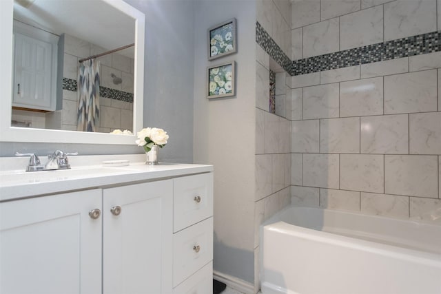 bathroom featuring vanity and shower / bath combo with shower curtain