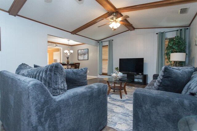 living room with vaulted ceiling with beams, wood-type flooring, ceiling fan with notable chandelier, and ornamental molding