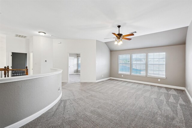 empty room with hardwood / wood-style flooring and crown molding