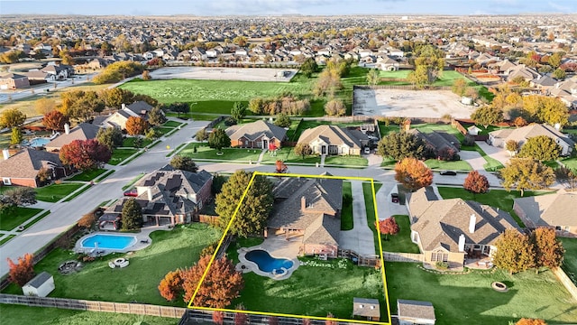 birds eye view of property with a residential view