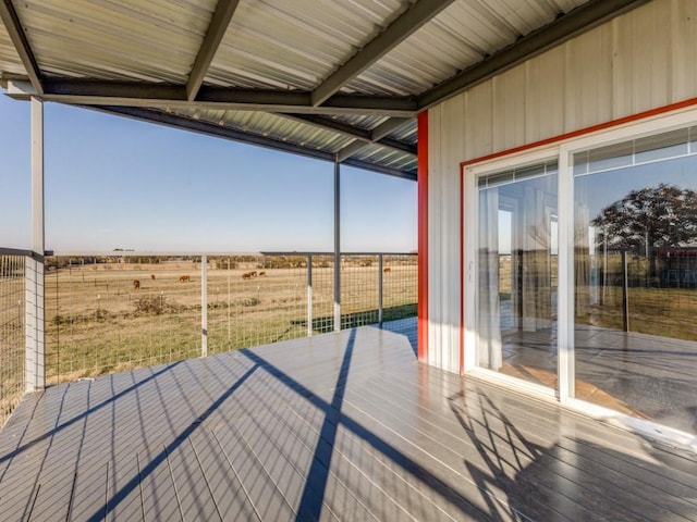 wooden terrace with a rural view