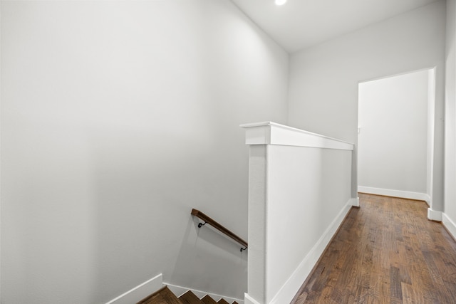 corridor featuring dark hardwood / wood-style flooring