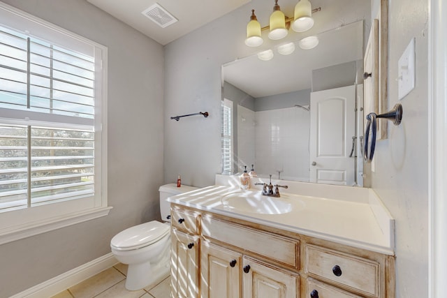 full bath with tile patterned flooring, a healthy amount of sunlight, visible vents, and vanity