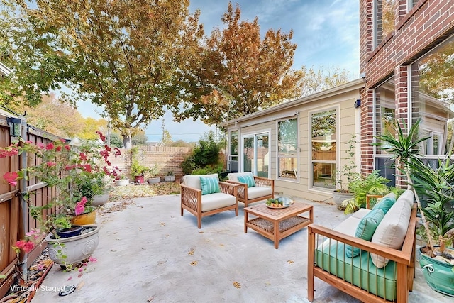 view of patio / terrace with a fenced backyard and outdoor lounge area