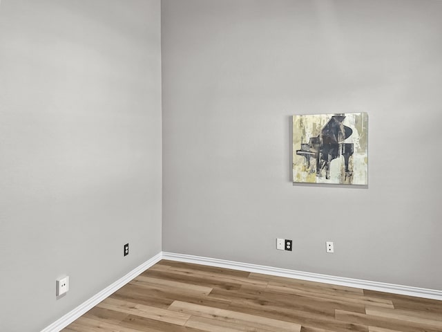 spare room featuring light hardwood / wood-style floors