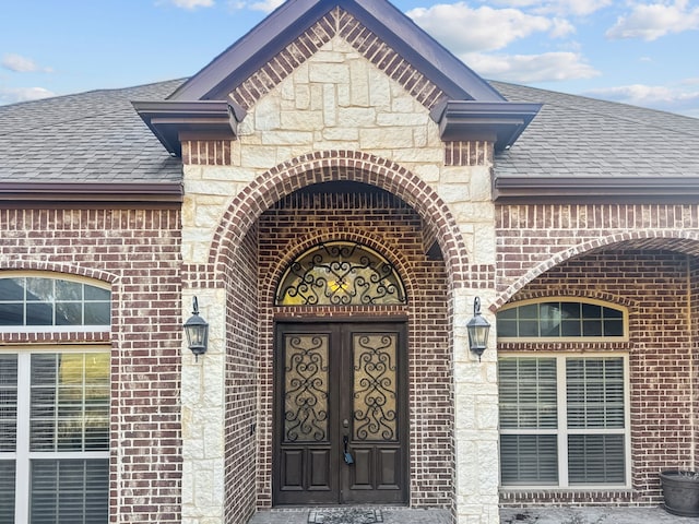 entrance to property featuring french doors