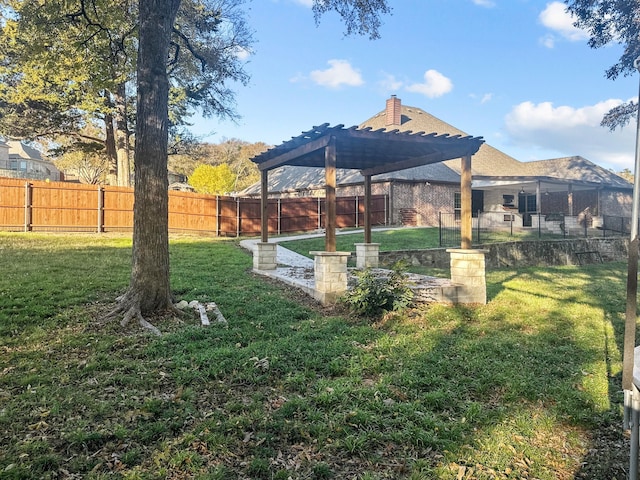 view of yard with a pergola