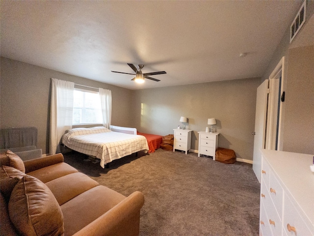 bedroom with dark colored carpet and ceiling fan